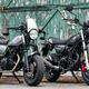 The one with all the fancy custom bits attached, left, can more than double to the price of the bike. (Image Credit: Kymco)